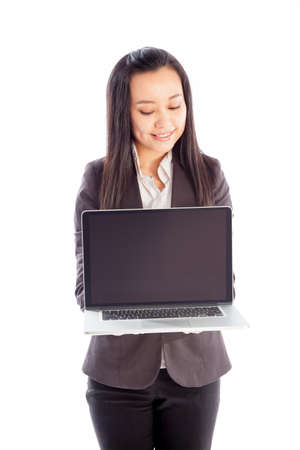 Attractive asian girl in her 30s shot in studio isolated on a white backgroundの写真素材