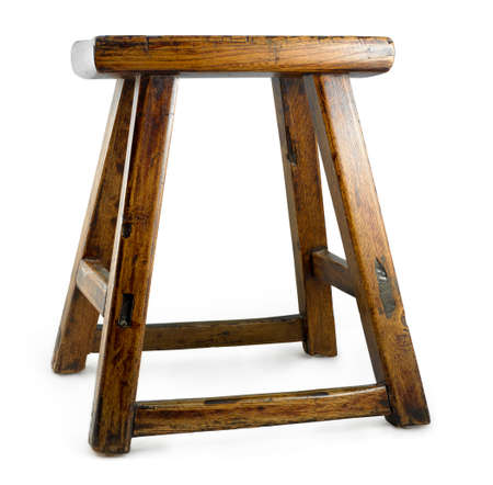 antique asian stool isolated on a white backgroundの写真素材
