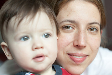 Close-up of a woman and her son smilingの写真素材