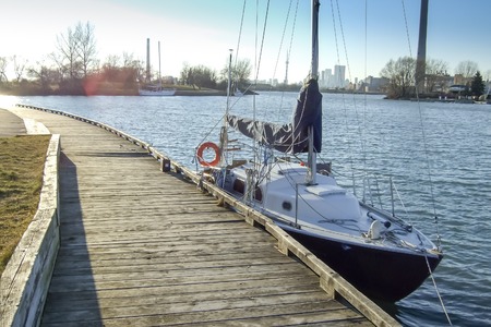 Sailboat moored at a pier, Montagne, Trentino, Italyの写真素材