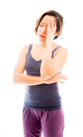 Young woman suffering from headacheの写真素材