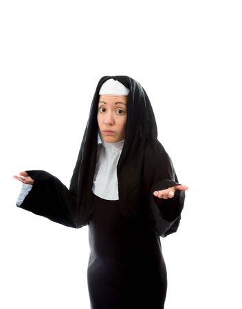 Young nun gesturing and shruggingの写真素材