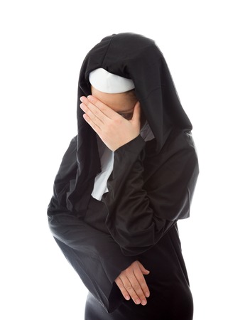Young nun looking depressedの写真素材