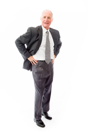 Businessman standing with his arms akimboの写真素材