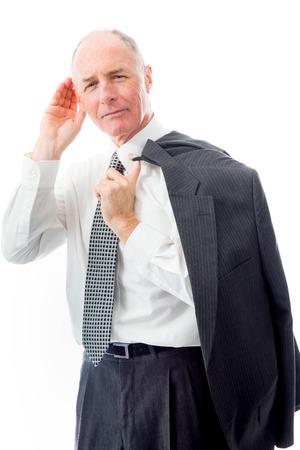Businessman trying to listen isolated on white backgroundの写真素材