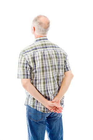 Rear view of a senior man thinkingの写真素材