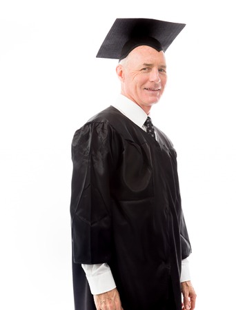 Side profile of a senior male graduate smilingの写真素材
