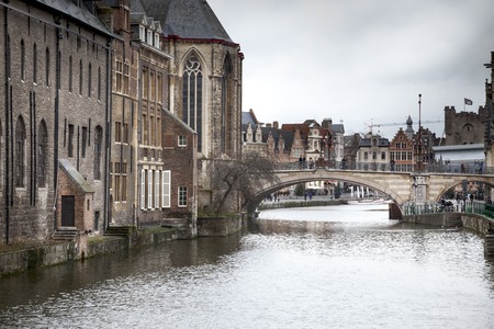 Arch bridge across a river, Saint Michael's Bridge, River Lys, Ghent, Belgium 2011-12-29 9:36:12 AMのeditorial素材