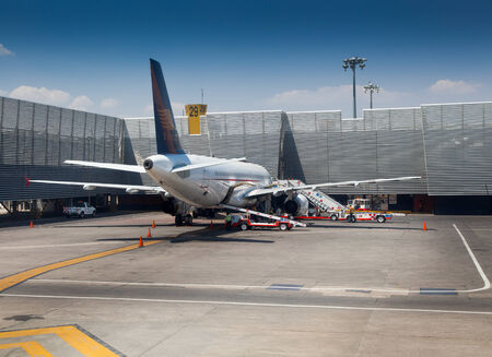 Airplane at an airport, Benito Juarez International Airport, Mexico City, Mexico 2011-06-15 3:00:46 PMのeditorial素材