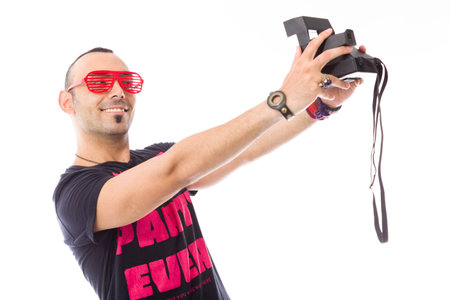 Model in studio isolated on plain grey backgroundの写真素材