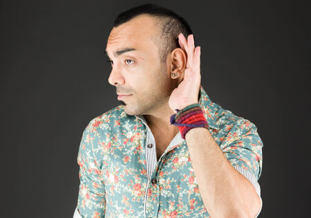 Model in studio isolated on plain grey backgroundの写真素材