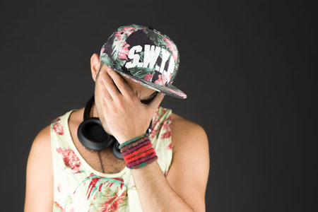 Model in studio isolated on plain grey backgroundの写真素材