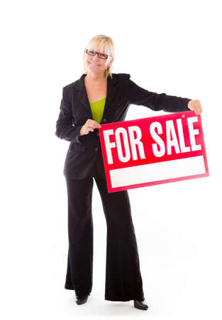 Model in studio isolated on plain grey backgroundの写真素材