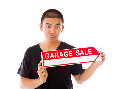 Model in studio isolated on plain grey backgroundの写真素材