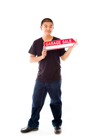 Model in studio isolated on plain grey backgroundの写真素材