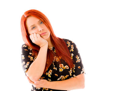 Bored Female Model isolated on white backgroundの写真素材
