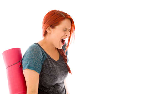 Angry female Model isolated on white backgroundの写真素材