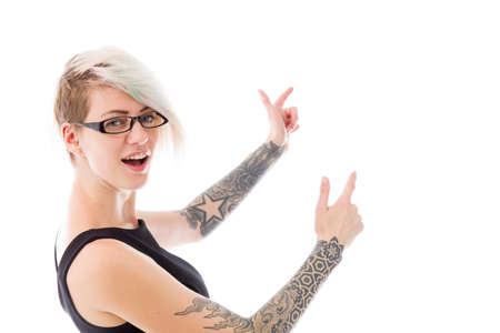 female Model pointing isolated on white backgroundの写真素材