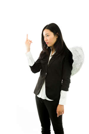 Attractive Asian young adult woman in angels and demonの写真素材