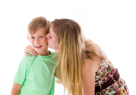 caucasian brother and siter teenager isolated on white backgroundの写真素材
