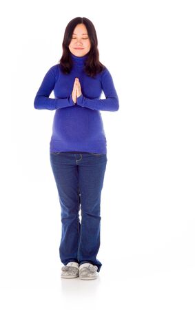 Pregnant adult asian woman isolated on white backgroundの写真素材