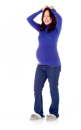 Pregnant adult asian woman isolated on white backgroundの写真素材