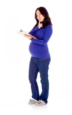 Pregnant adult asian woman isolated on white backgroundの写真素材