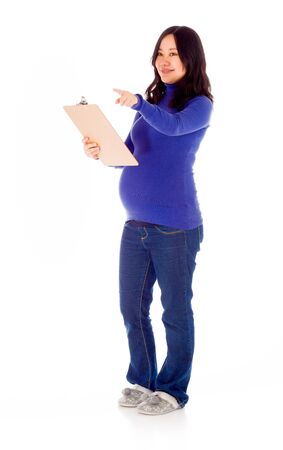 Pregnant adult asian woman isolated on white backgroundの写真素材