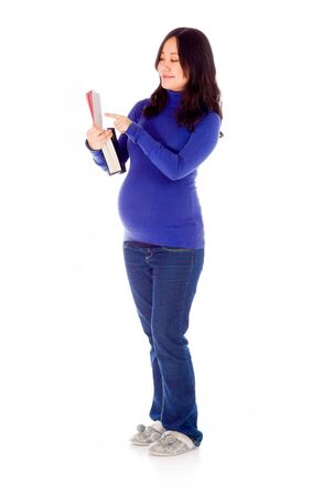 Pregnant adult asian woman isolated on white backgroundの写真素材