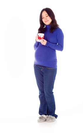 Pregnant adult asian woman isolated on white backgroundの写真素材