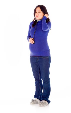 Pregnant adult asian woman isolated on white backgroundの写真素材