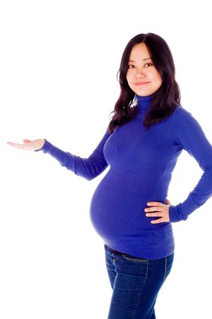 Pregnant adult asian woman isolated on white backgroundの写真素材