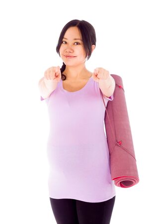 Pregnant adult asian woman isolated on white backgroundの写真素材