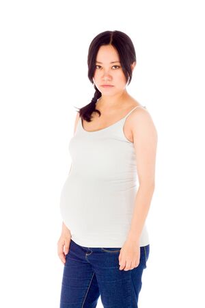 Pregnant adult asian woman isolated on white backgroundの写真素材