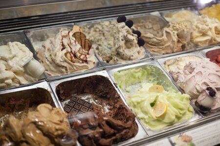 Different flavors of ice cream displayed at Ice Cream parlor, Barcelona, Catalonia, Spainの写真素材
