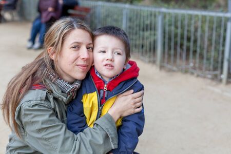 Portrait of mid adult woman caring his son, Barcelona, Catalonia, Spaincolor image, canon 5DmkIIの写真素材