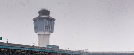 Low angle view of air traffic control tower in winter weathercolor image, canon 5DmkIIの写真素材