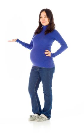 Pregnant adult asian woman isolated on white backgroundの写真素材