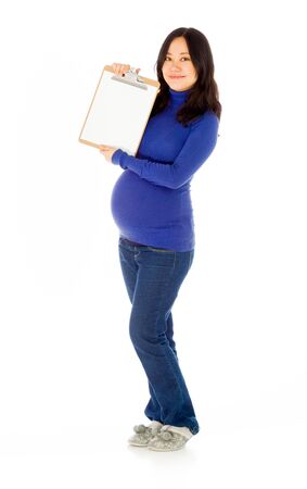 Pregnant adult asian woman isolated on white backgroundの写真素材