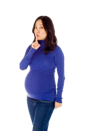 Pregnant adult asian woman isolated on white backgroundの写真素材