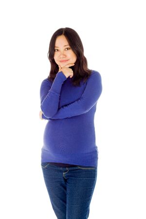 Pregnant adult asian woman isolated on white backgroundの写真素材