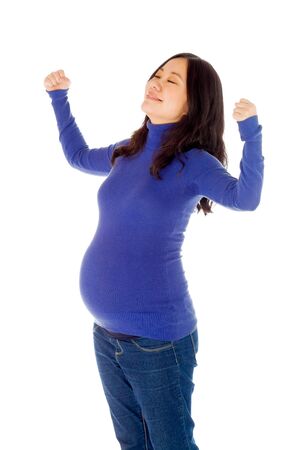 Pregnant adult asian woman isolated on white backgroundの写真素材