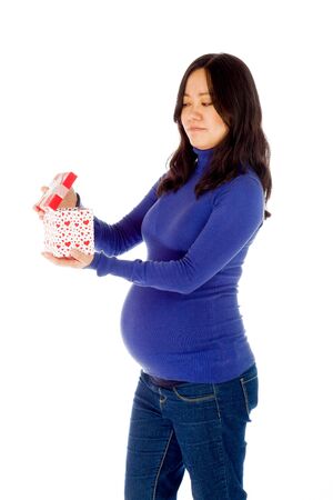 Pregnant adult asian woman isolated on white backgroundの写真素材