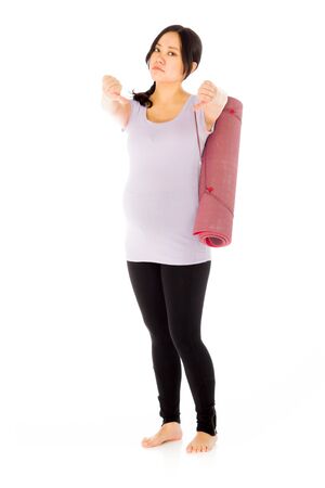 Pregnant adult asian woman isolated on white backgroundの写真素材