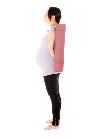 Pregnant adult asian woman isolated on white backgroundの写真素材