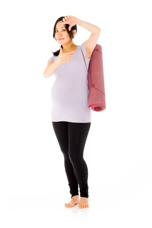 Pregnant adult asian woman isolated on white backgroundの写真素材