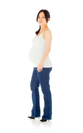 Pregnant adult asian woman isolated on white backgroundの写真素材