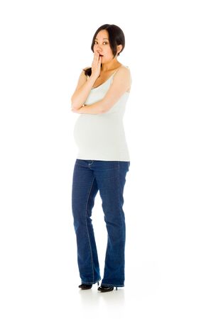 Pregnant adult asian woman isolated on white backgroundの写真素材