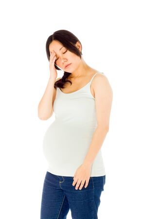 Pregnant adult asian woman isolated on white backgroundの写真素材