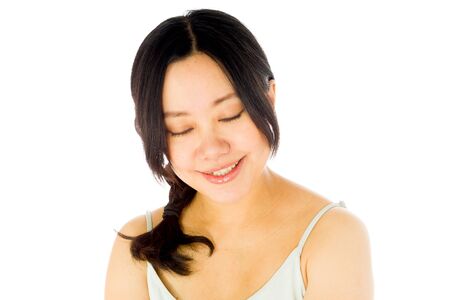Pregnant adult asian woman isolated on white backgroundの写真素材